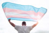 Transgender,Man,Holding,Waving,Transgender,Flag,,Concept,Picture,About,Human