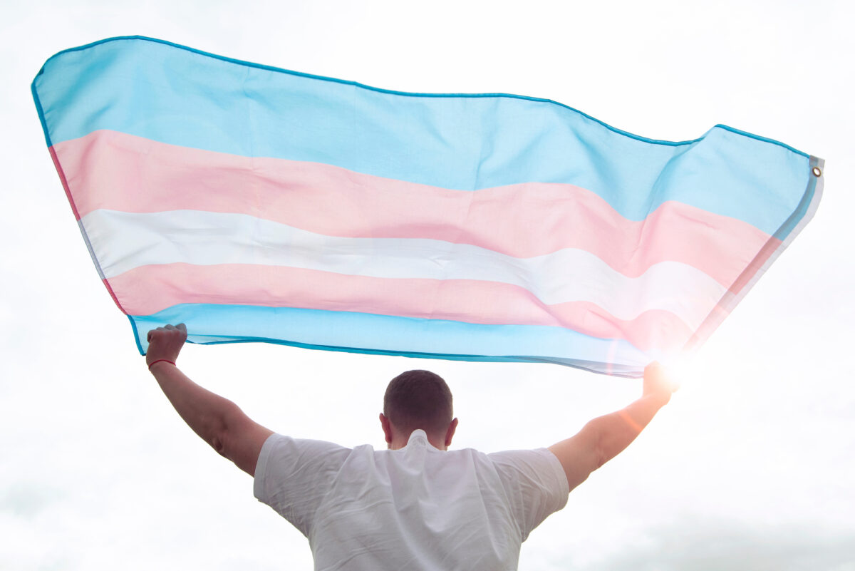 Transgender,Man,Holding,Waving,Transgender,Flag,,Concept,Picture,About,Human